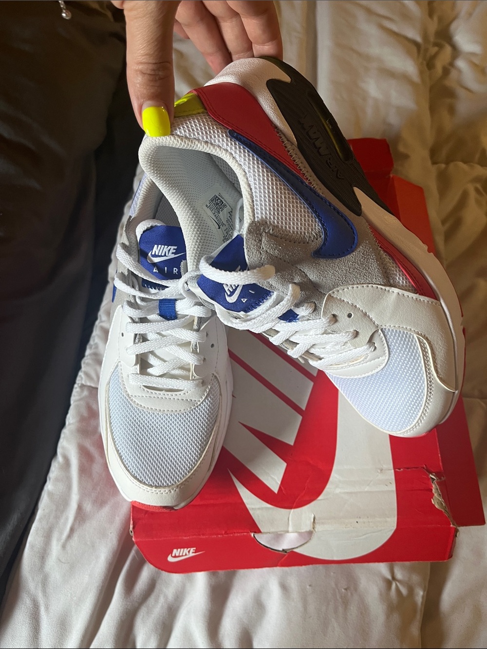 Nike White Sneakers with Blue and Red Accents